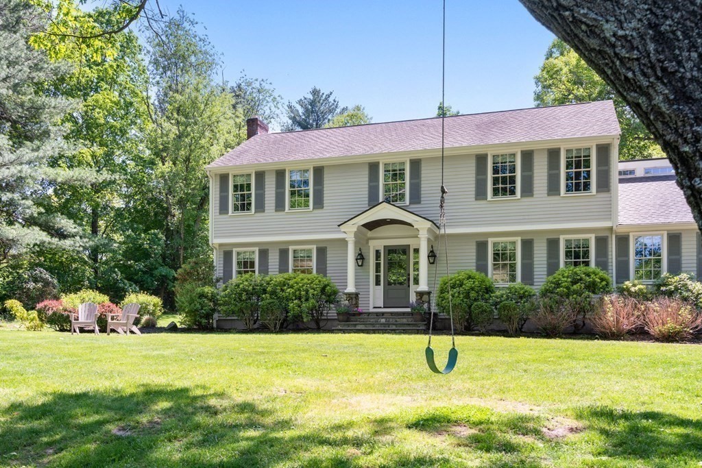 5 Deerfield Road Sherborn, MA 01770 - Photo 40 of 42 a front view of a house with garden