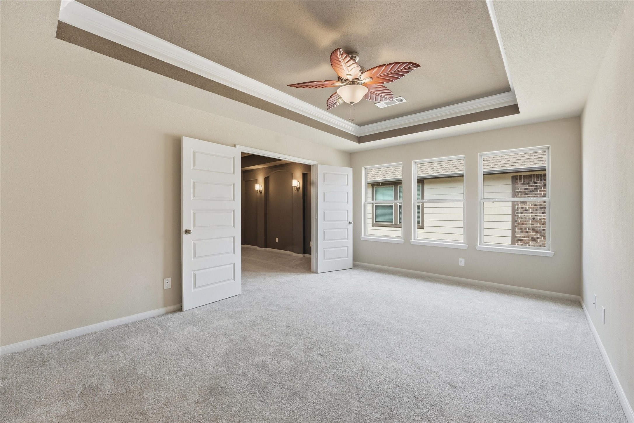 8673 Burdekin Road Magnolia, TX 77354 - Photo 42 of 50 Love the windows and trayed ceiling in the spacious Game Room.So many opportunities to personalize this space.