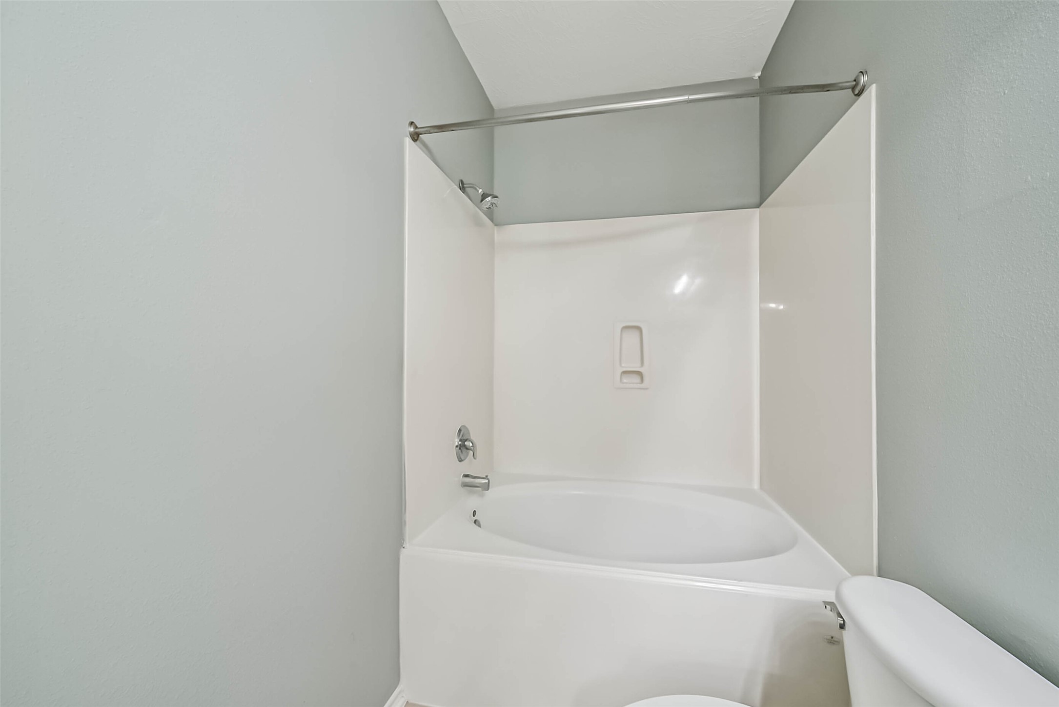 8726 Old Maple Lane Humble, TX 77338 - Photo 19 of 35 a bathroom with a bathtub and a shower