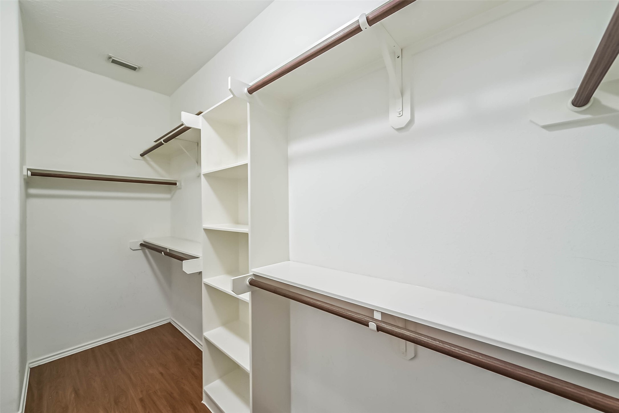 8726 Old Maple Lane Humble, TX 77338 - Photo 20 of 35 a view of an empty walk in closet