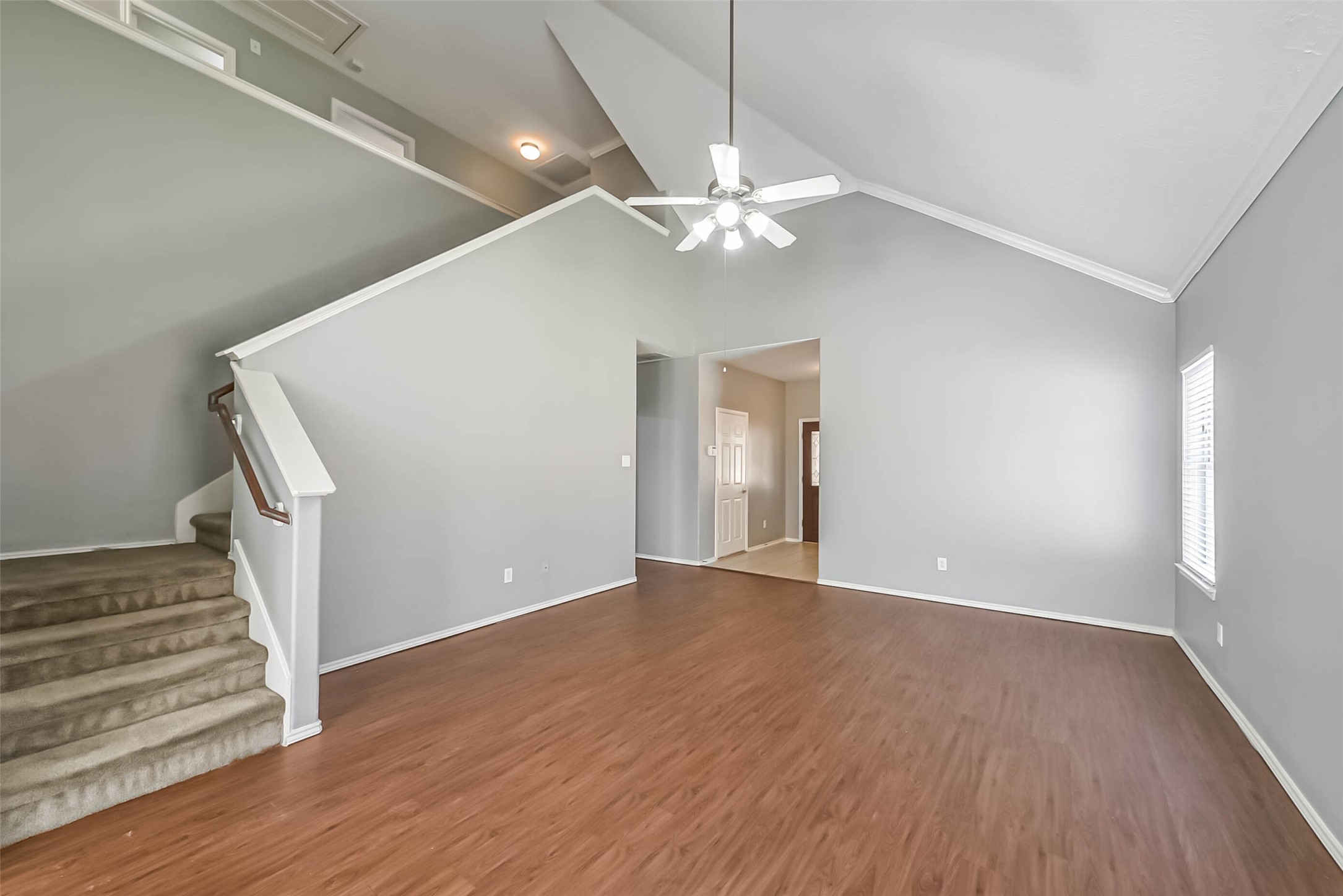 8726 Old Maple Lane Humble, TX 77338 - Photo 5 of 35 wooden floor in an empty room with a chandelier