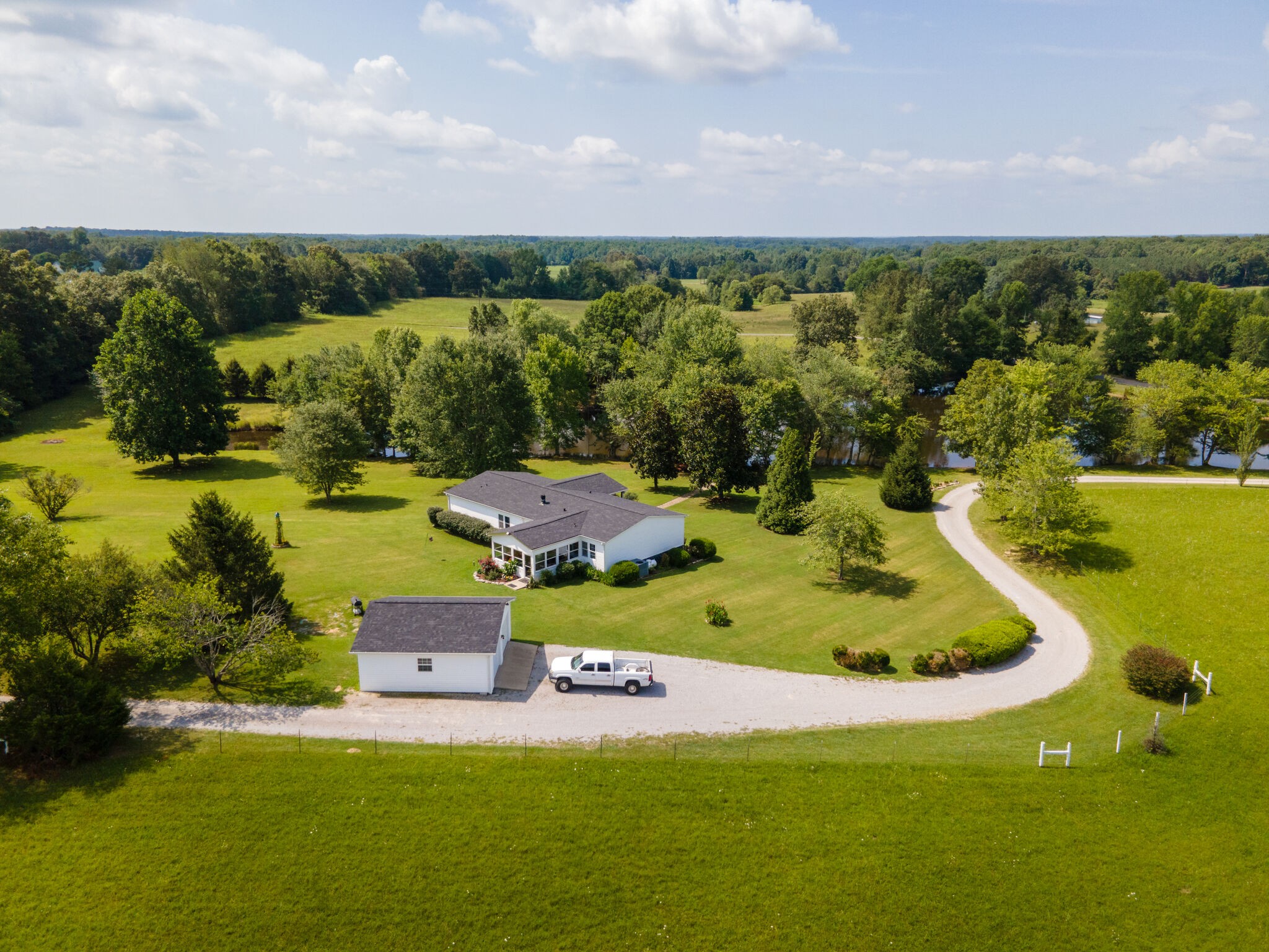 180 White Road Pulaski, TN 38478 - Photo 44 of 61 a view of a swimming pool with a yard