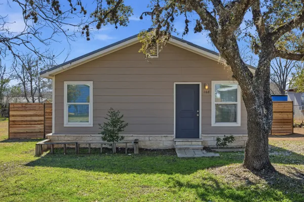 a front view of house with yard