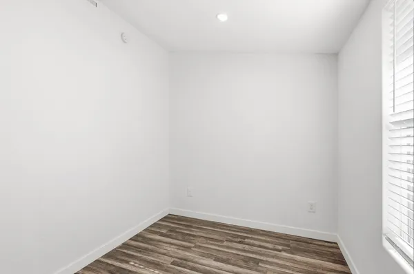 a view of a room that has a window