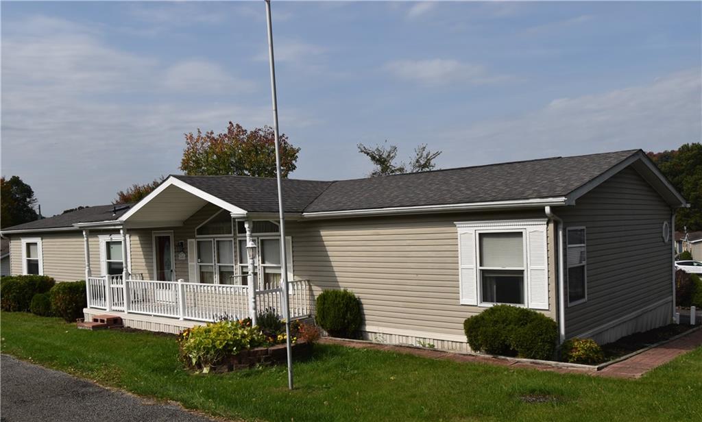 600 Deana Way Rochester, PA 15074 - Photo 1 of 22 a front view of a house with a garden