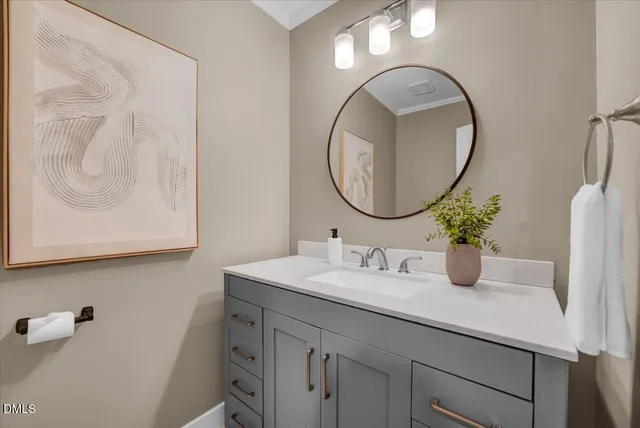 a kitchen with a refrigerator sink and cabinets