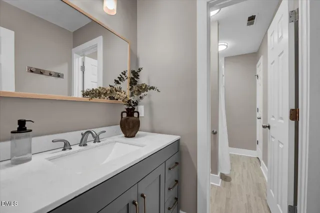 a bedroom with bed and window