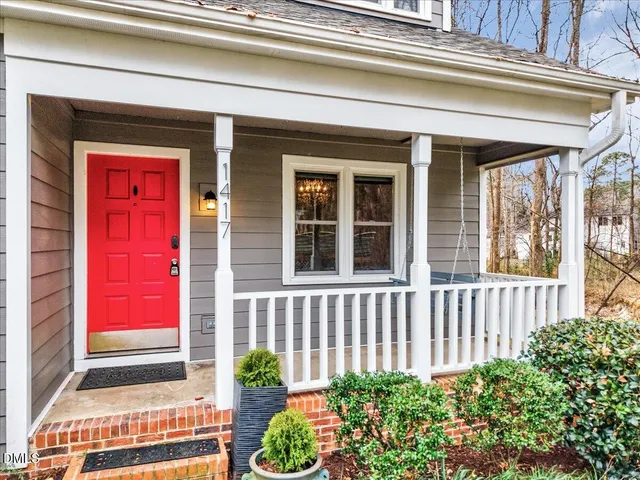 a front view of a house with a garage