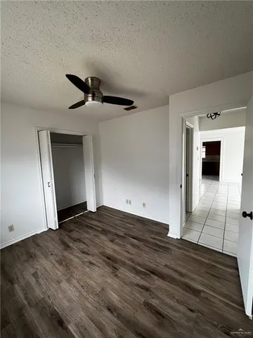 a view of a livingroom with wooden floor