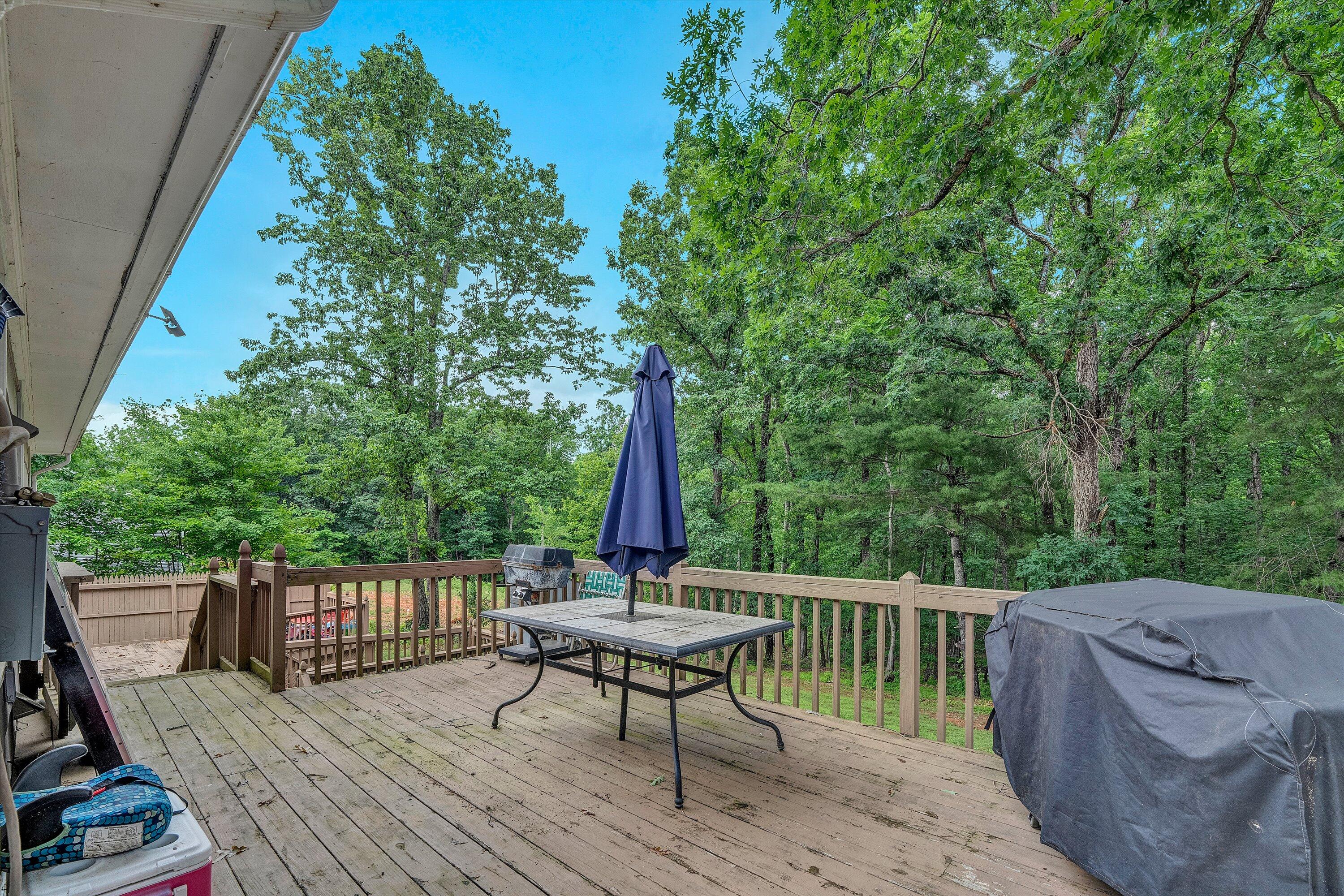 2095 Webster Road Glade Hill, VA 24092 - Photo 15 of 20 a view of a chairs and table on the wooden floor