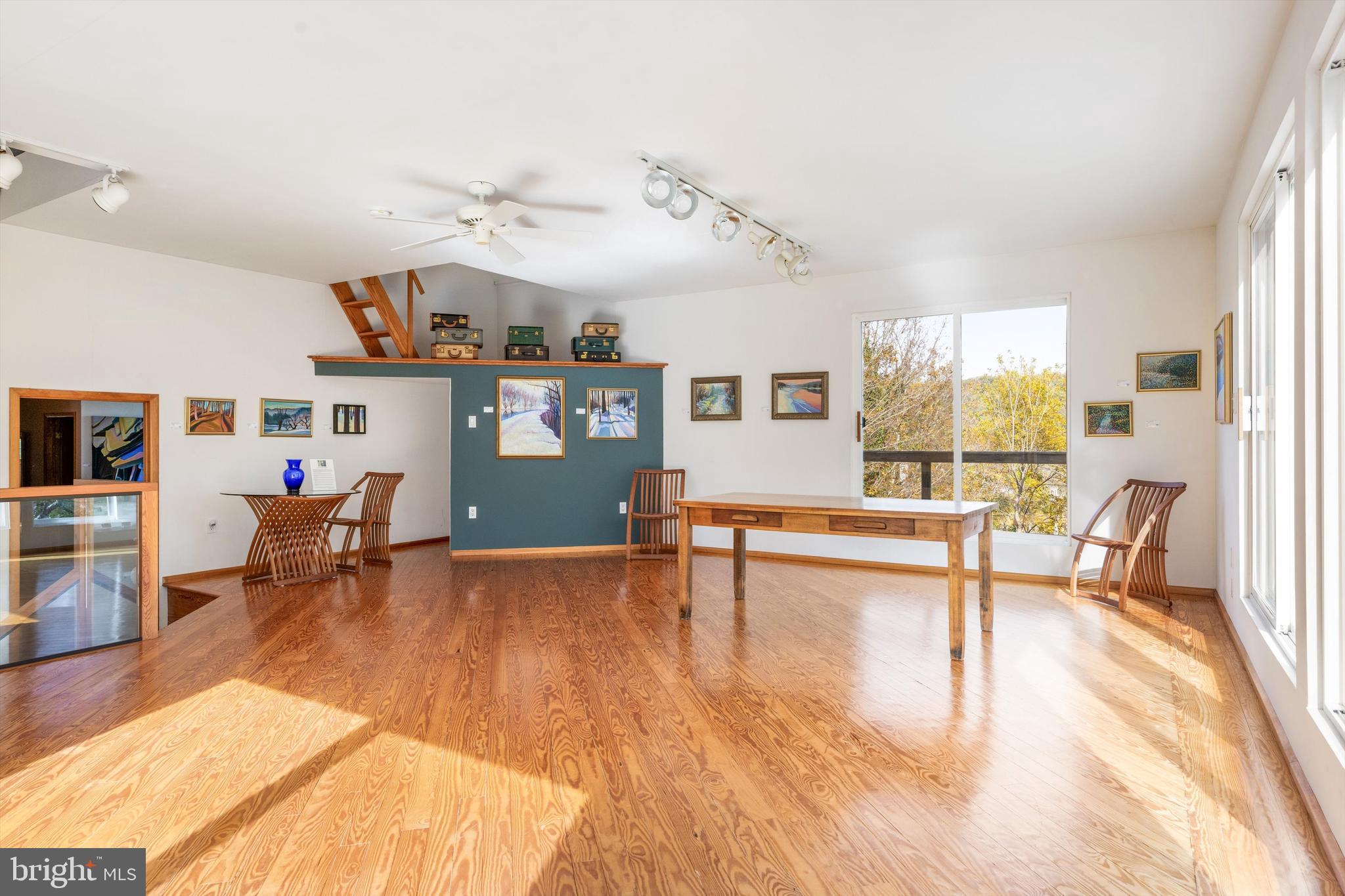 7640 Tohickon Hill Road Pipersville, PA 18947 - Photo 16 of 34 a living room with furniture and wooden floor