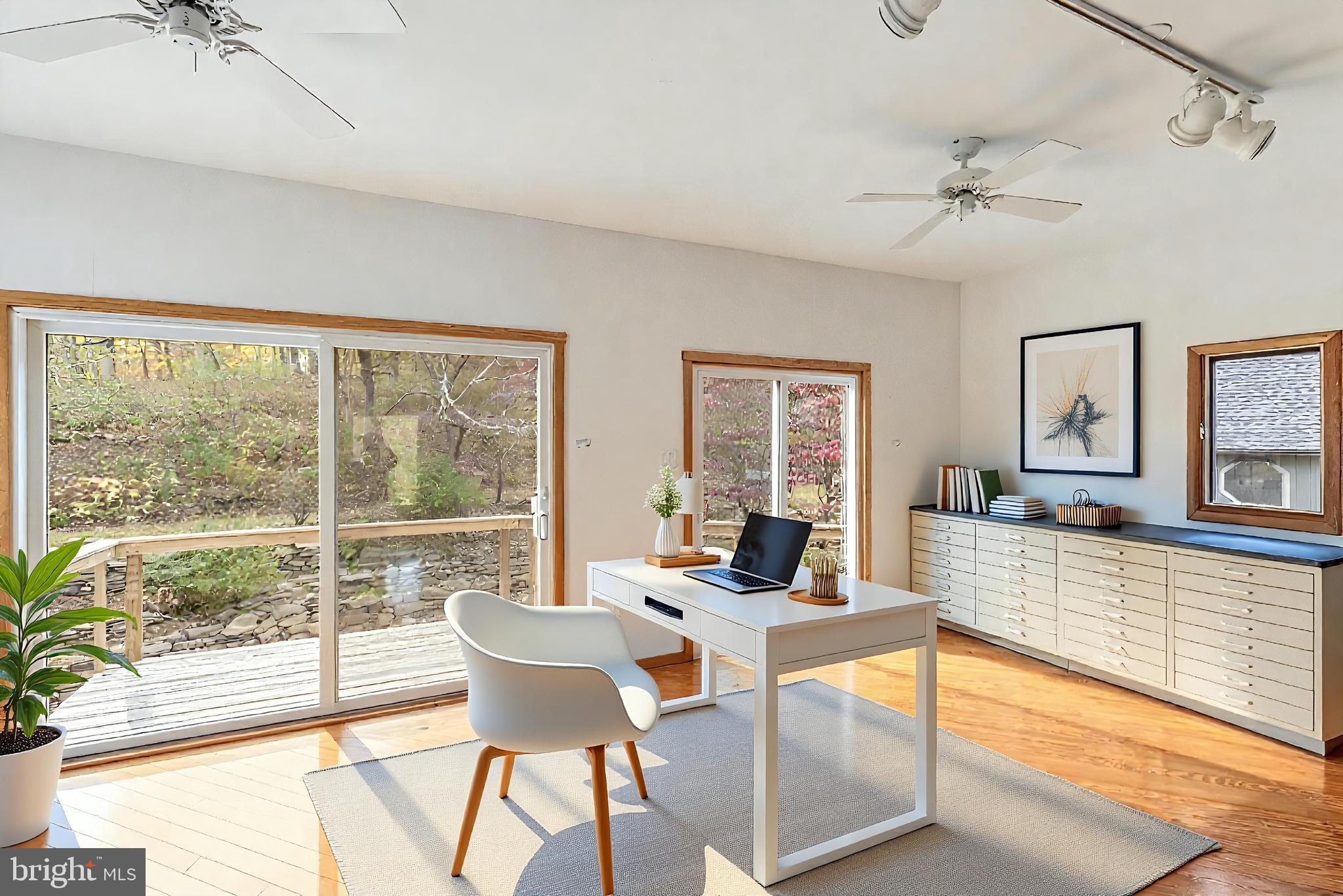 7640 Tohickon Hill Road Pipersville, PA 18947 - Photo 19 of 34 a living room with furniture and a large window