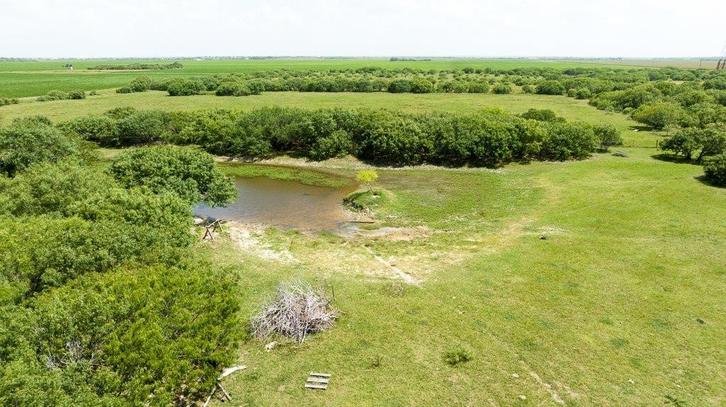0 Gin Road Woodsboro, TX 78340 - Photo 5 of 26 a view of a garden with an outdoor space
