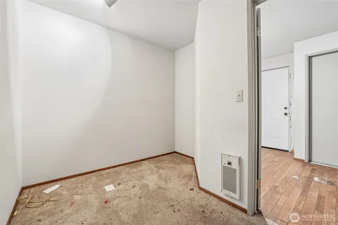 a bathroom with a sink toilet and a mirror
