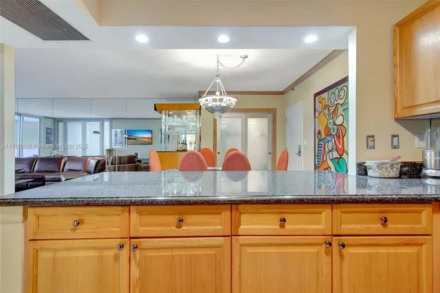 a bedroom with a bed and chair