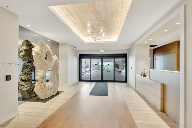 a view of a chairs and table in the patio