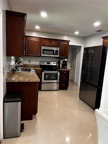 $519,900 | 7151 Pershing Street, Hollywood, FL 33024