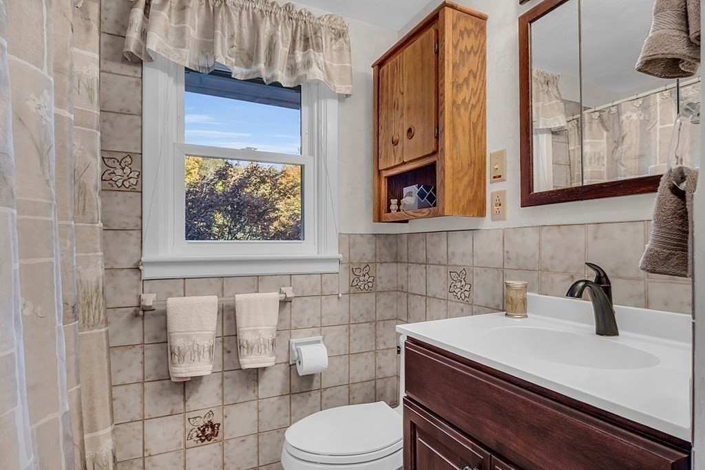 3 Johnson Road Chelmsford, MA 01824 - Photo 23 of 42 a bathroom with a sink toilet and shower