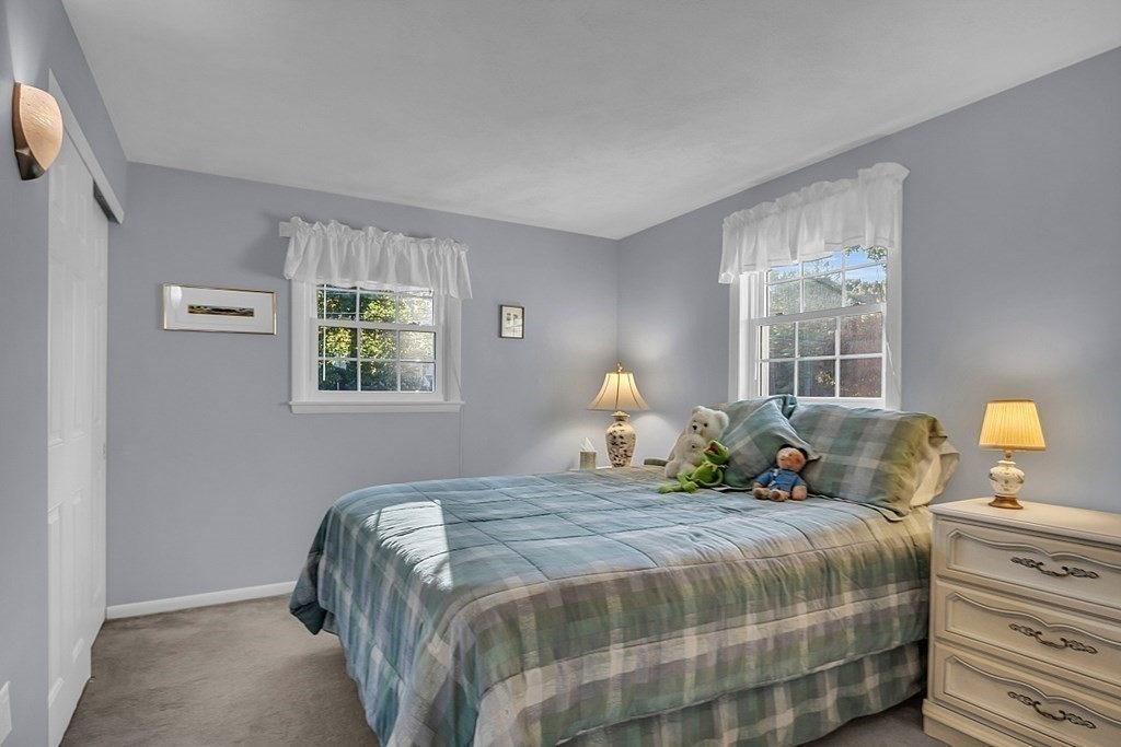3 Johnson Road Chelmsford, MA 01824 - Photo 25 of 42 a bedroom with a bed and window