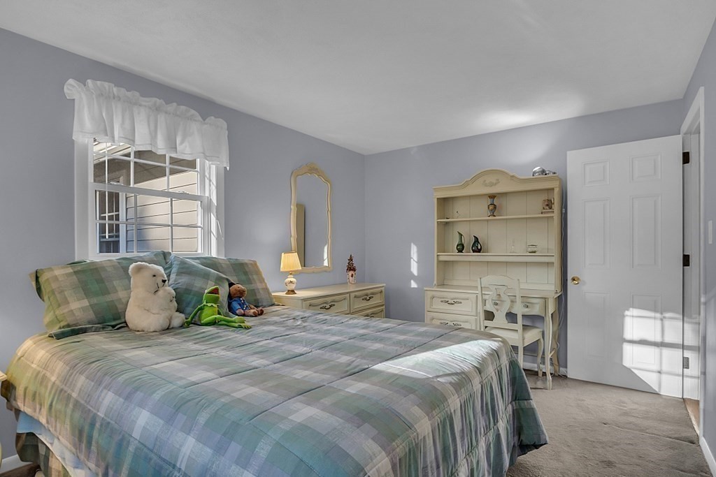 3 Johnson Road Chelmsford, MA 01824 - Photo 26 of 42 a bedroom with a bed and window