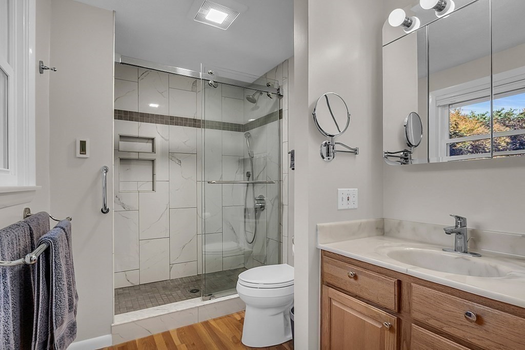 3 Johnson Road Chelmsford, MA 01824 - Photo 30 of 42 a bathroom with a granite countertop sink toilet and shower
