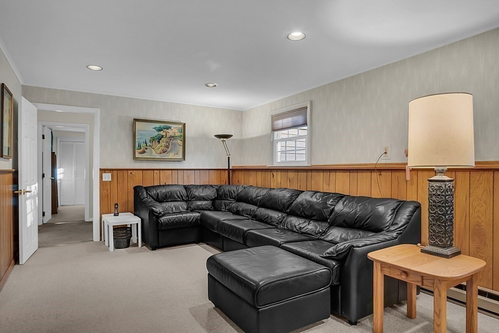 3 Johnson Road Chelmsford, MA 01824 - Photo 32 of 42 a living room with furniture and a couch