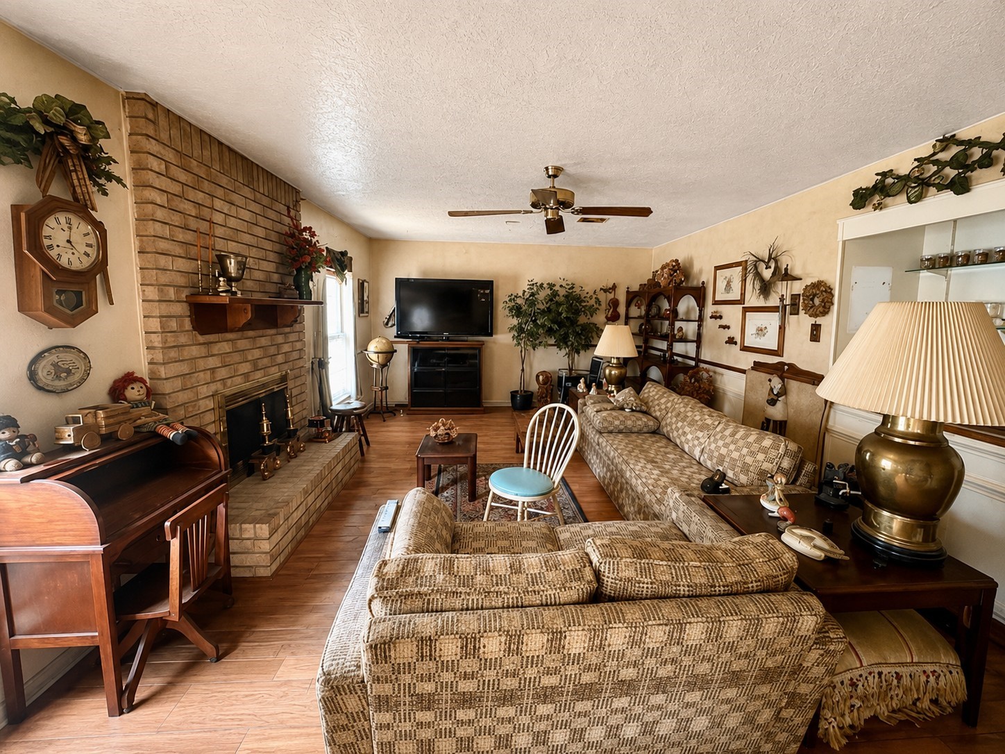 3626 Chapel Square Drive Spring, TX 77388 - Photo 7 of 15 The family room features a brick fireplace and backyard access, offering another inviting space ready to be reimagined.