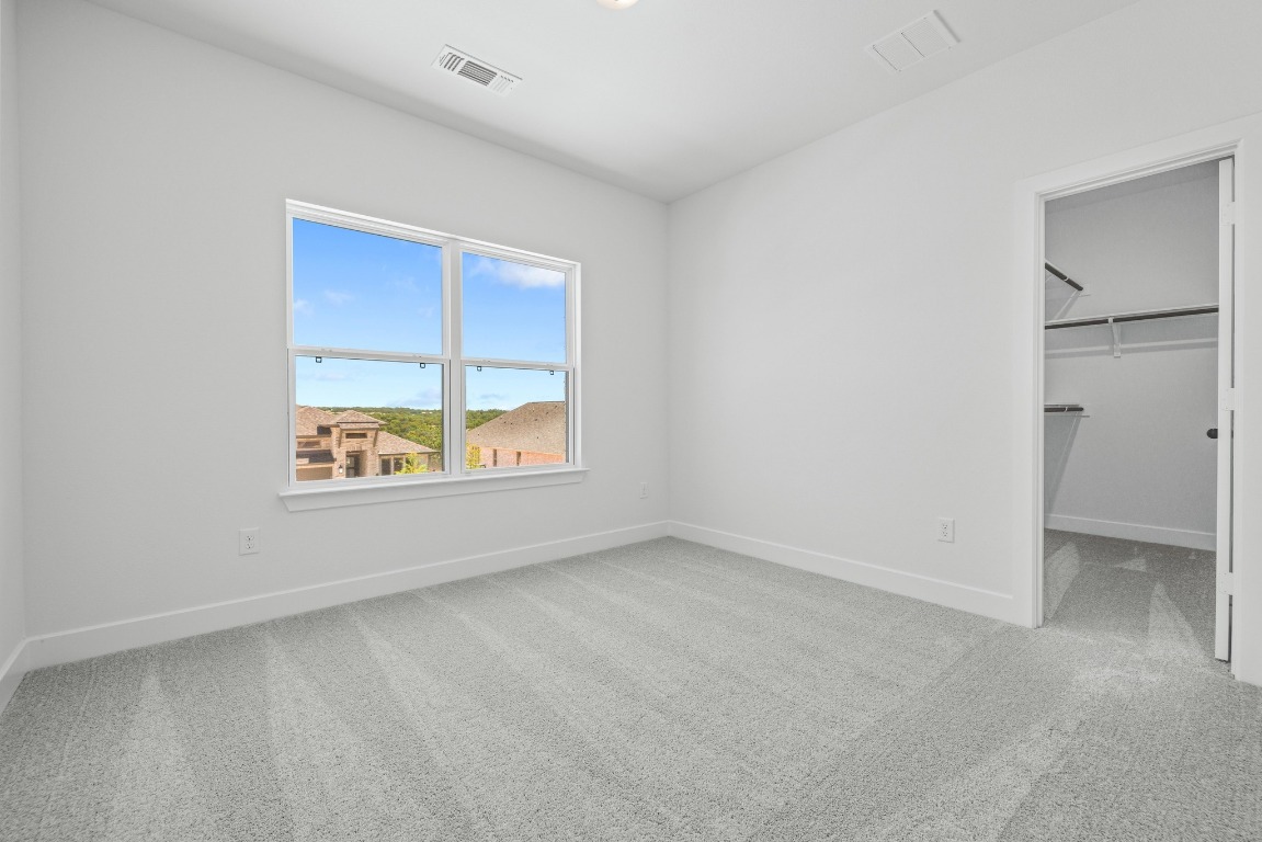 248 Star Rush Trail Georgetown, TX 78633 - Photo 17 of 27 an empty room with windows