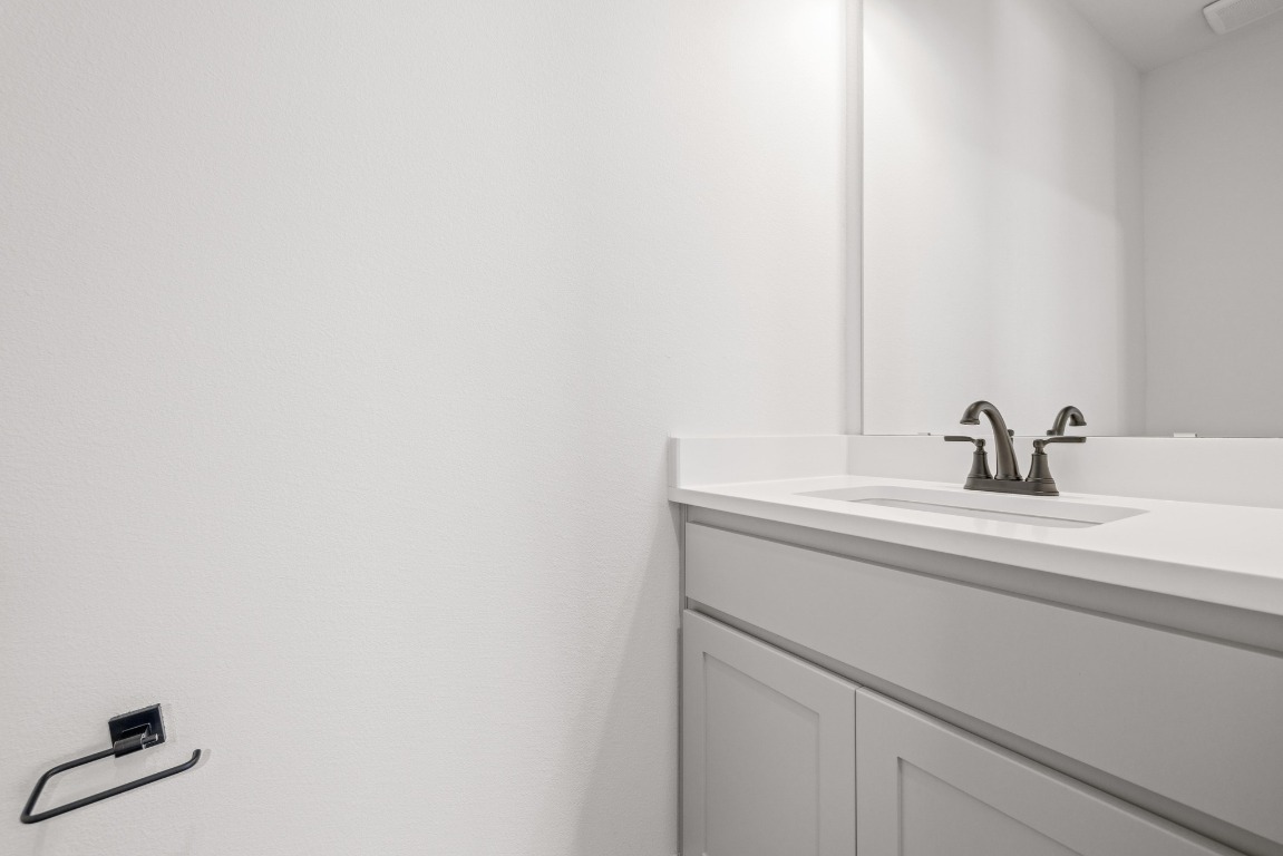 248 Star Rush Trail Georgetown, TX 78633 - Photo 20 of 27 a bathroom with a sink and mirror