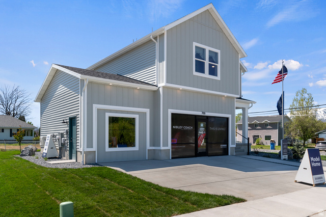 2819 South 710th West, Unit 14 Logan, UT 84321 - Photo 1 of 24 Contemporary exterior featuring light gray horizontal siding and board-and-batten accents
