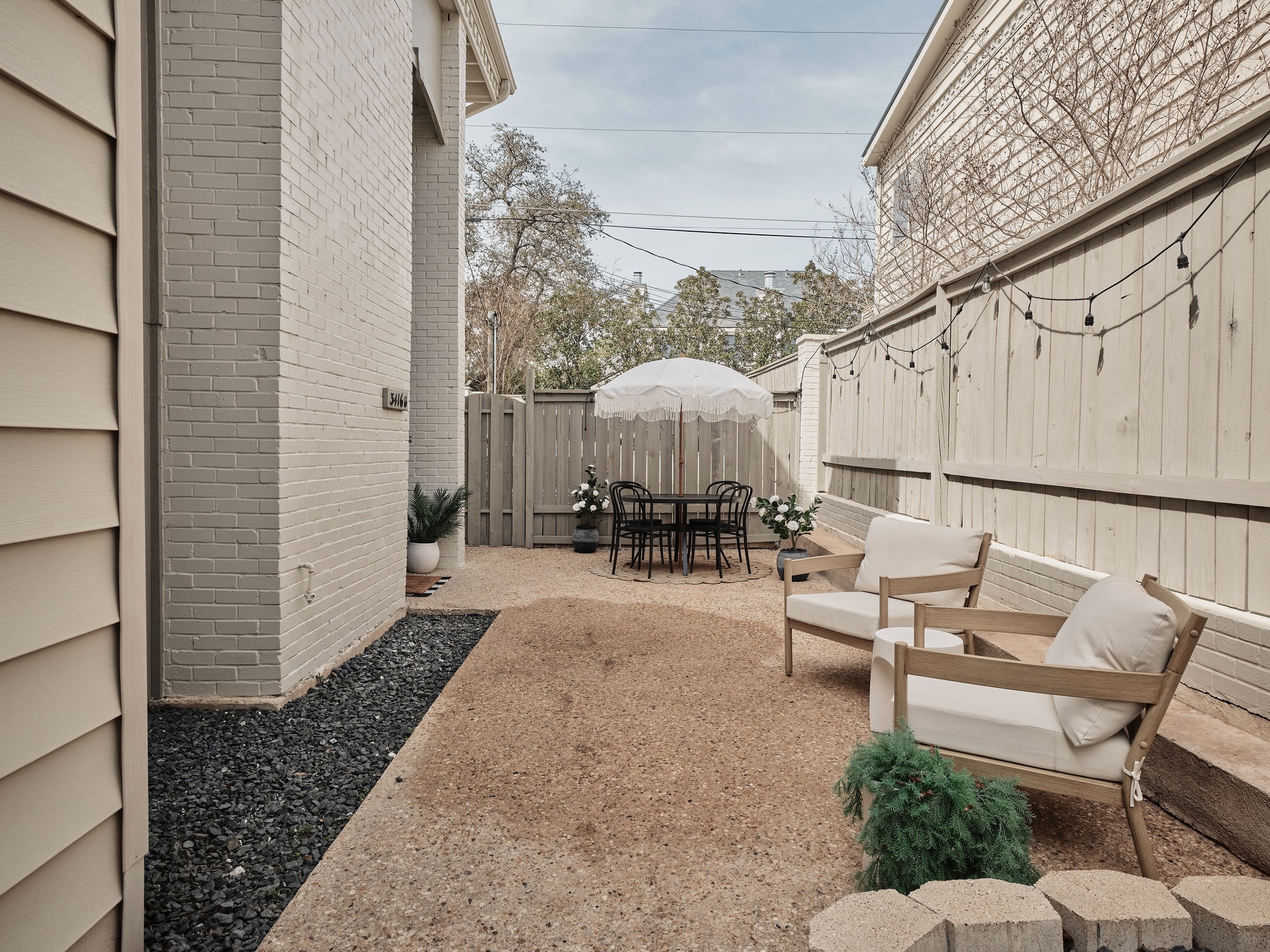 3416 Pecos Street, Unit B Austin, TX 78703 - Photo 22 of 23 Fenced backyard featuring a patio and outdoor dining space