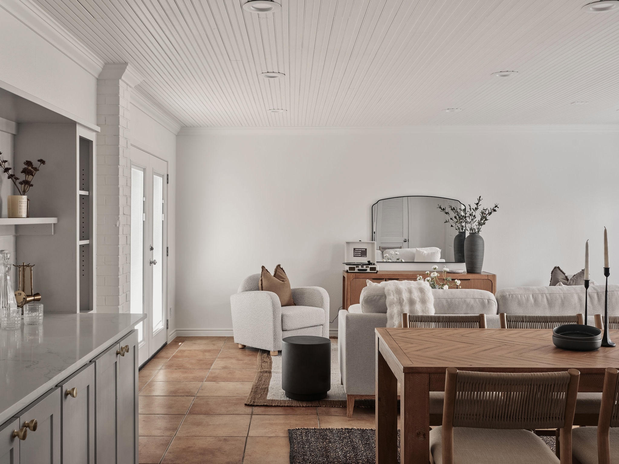 3416 Pecos Street, Unit B Austin, TX 78703 - Photo 6 of 23 Dining room with light tile patterned floors, crown molding, and wood ceiling
