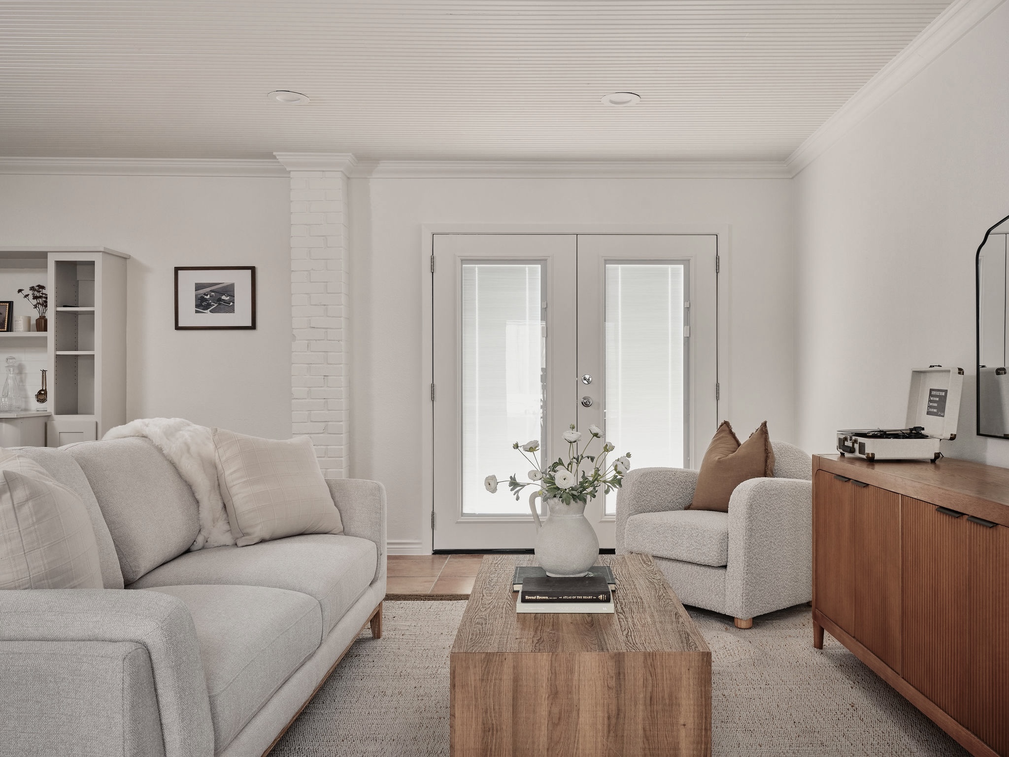 3416 Pecos Street, Unit B Austin, TX 78703 - Photo 7 of 23 Living area featuring french doors and crown molding