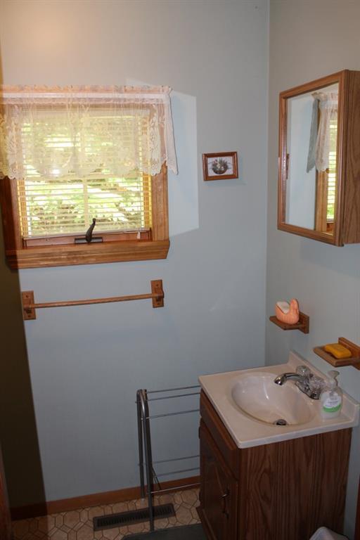 356 Greenwoods Road Peru, ME 04290 - Photo 22 of 35 1/2 bath on the main level off the...