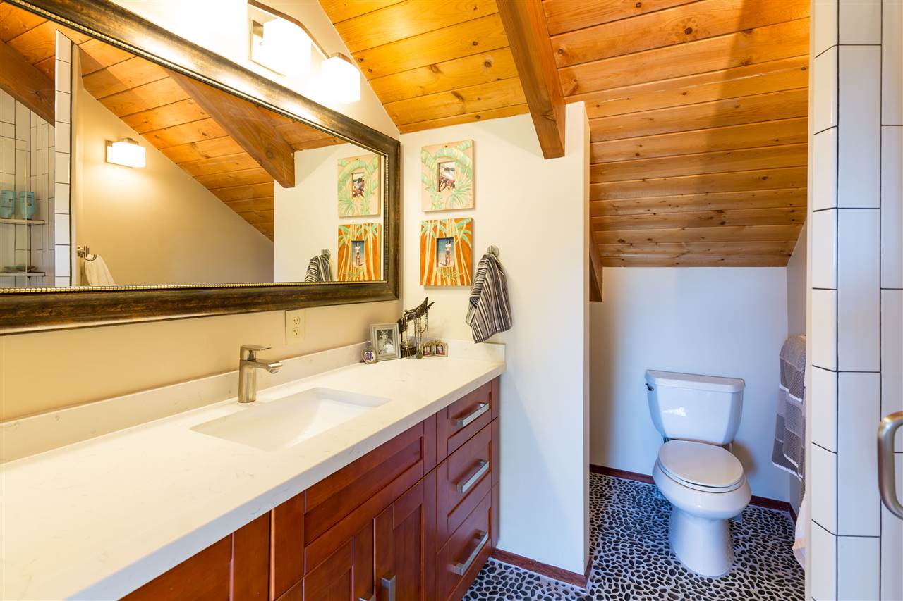 320 Lower Kimo Drive Kula, HI 96790 - Photo 14 of 27 a bathroom with a sink a toilet and mirror