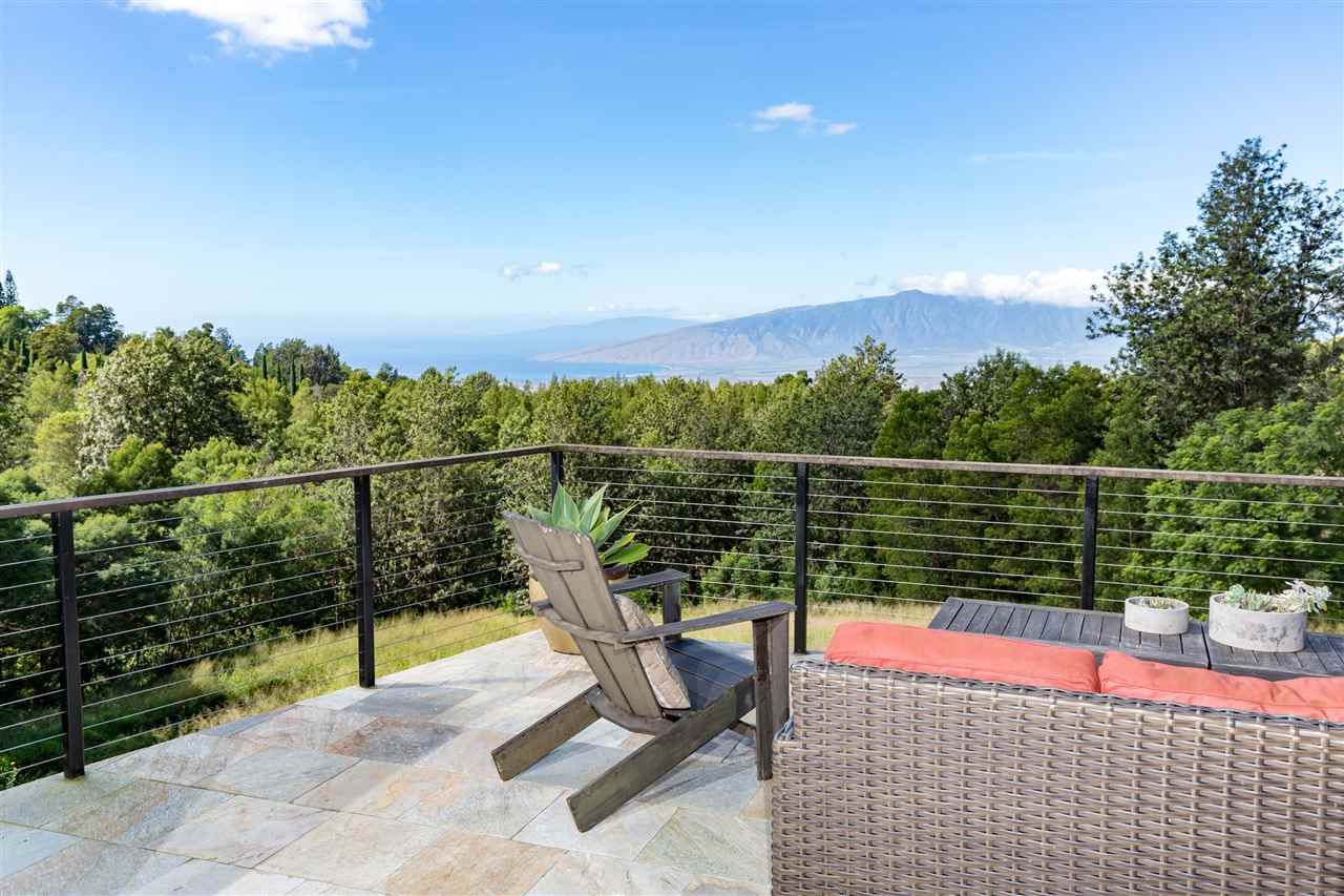 320 Lower Kimo Drive Kula, HI 96790 - Photo 19 of 27 a view of a balcony with wooden floor and fence