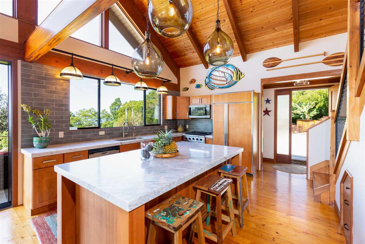 320 Lower Kimo Drive Kula, HI 96790 - Photo 7 of 27 a view of a dining room with a table and chairs