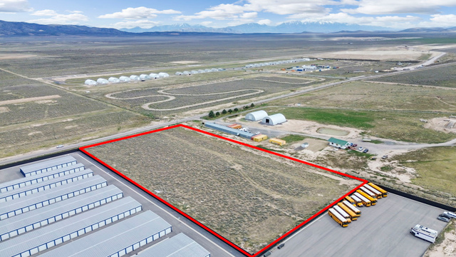 727 South Allens Rnch Road, Unit 8 Fairfield, UT 84013 - Photo 9 of 16 Aerial view of sparsely populated area featuring a mountain backdrop and property boundaries highlighted