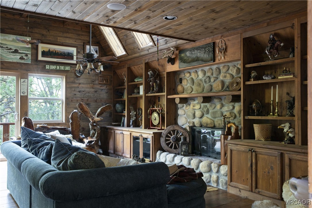 27710 West Shore Road Lake Arrowhead, CA 92352 - Photo 26 of 47 a living room with furniture