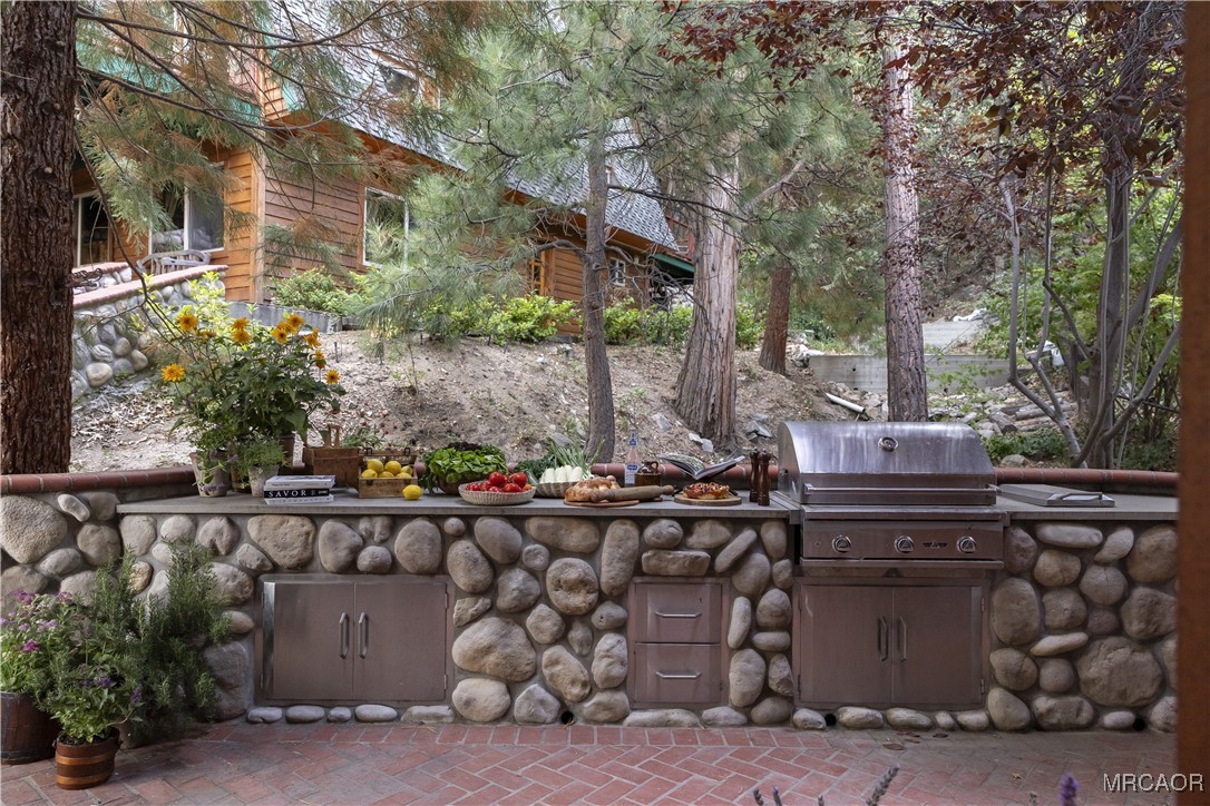 27710 West Shore Road Lake Arrowhead, CA 92352 - Photo 40 of 47 a view of a chairs and fire pit