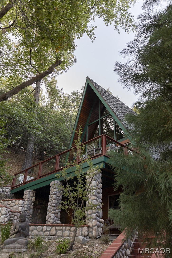 27710 West Shore Road Lake Arrowhead, CA 92352 - Photo 46 of 47 a view of a house with a yard