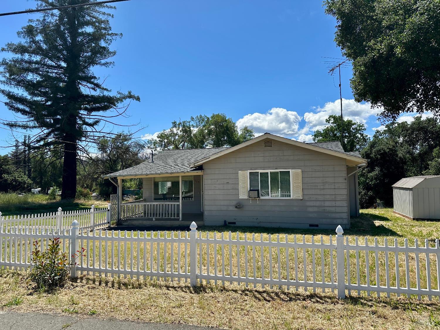 699 Mund Road St. Helena, CA 94574 - Photo 2 of 19 a view of a house with a yard