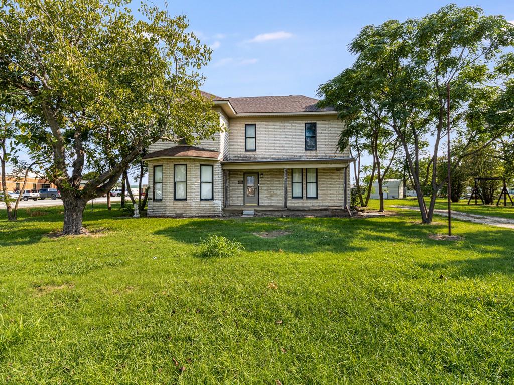 112 West Hackberry Street Malone, TX 76660 - Photo 32 of 38 a view of a house with a big yard