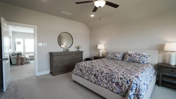 a bathroom with a double vanity sink a mirror and a shower