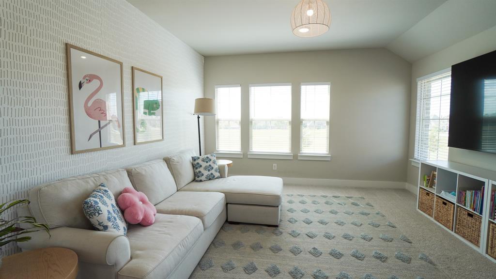 1836 Big Spring Drive Forney, TX 75126 - Photo 21 of 40 a living room with furniture and a window