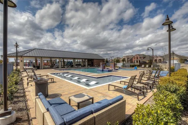 an aerial view of a house with a ocean view