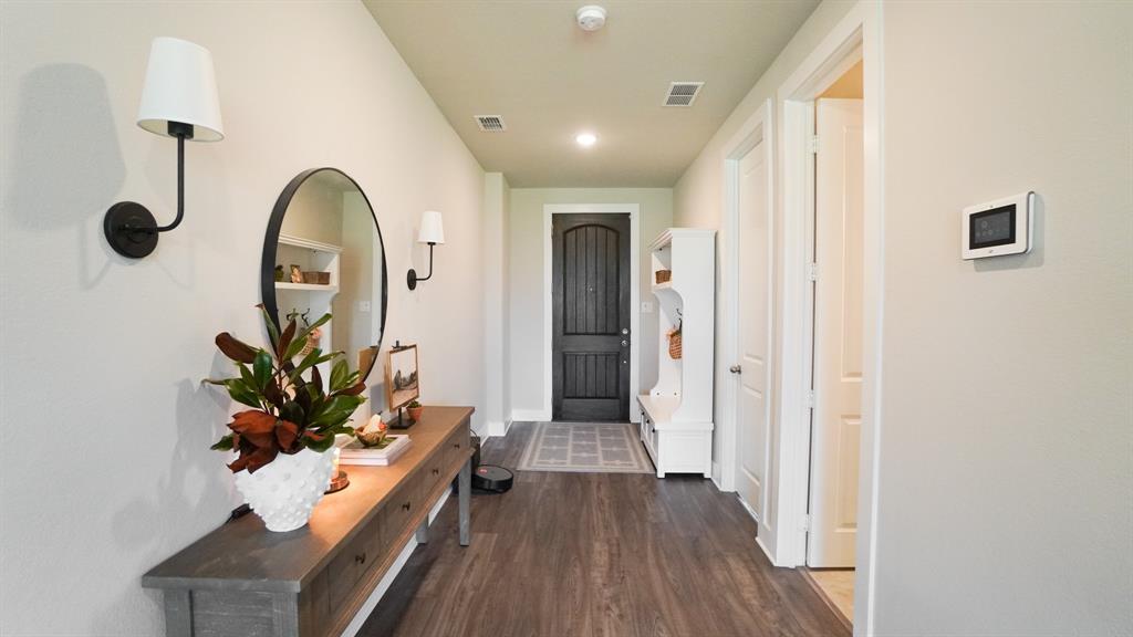 1836 Big Spring Drive Forney, TX 75126 - Photo 4 of 40 a view of entryway with wooden floor