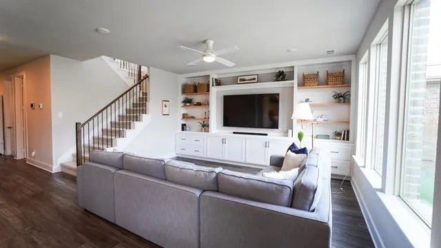 a view of a living room with a large window