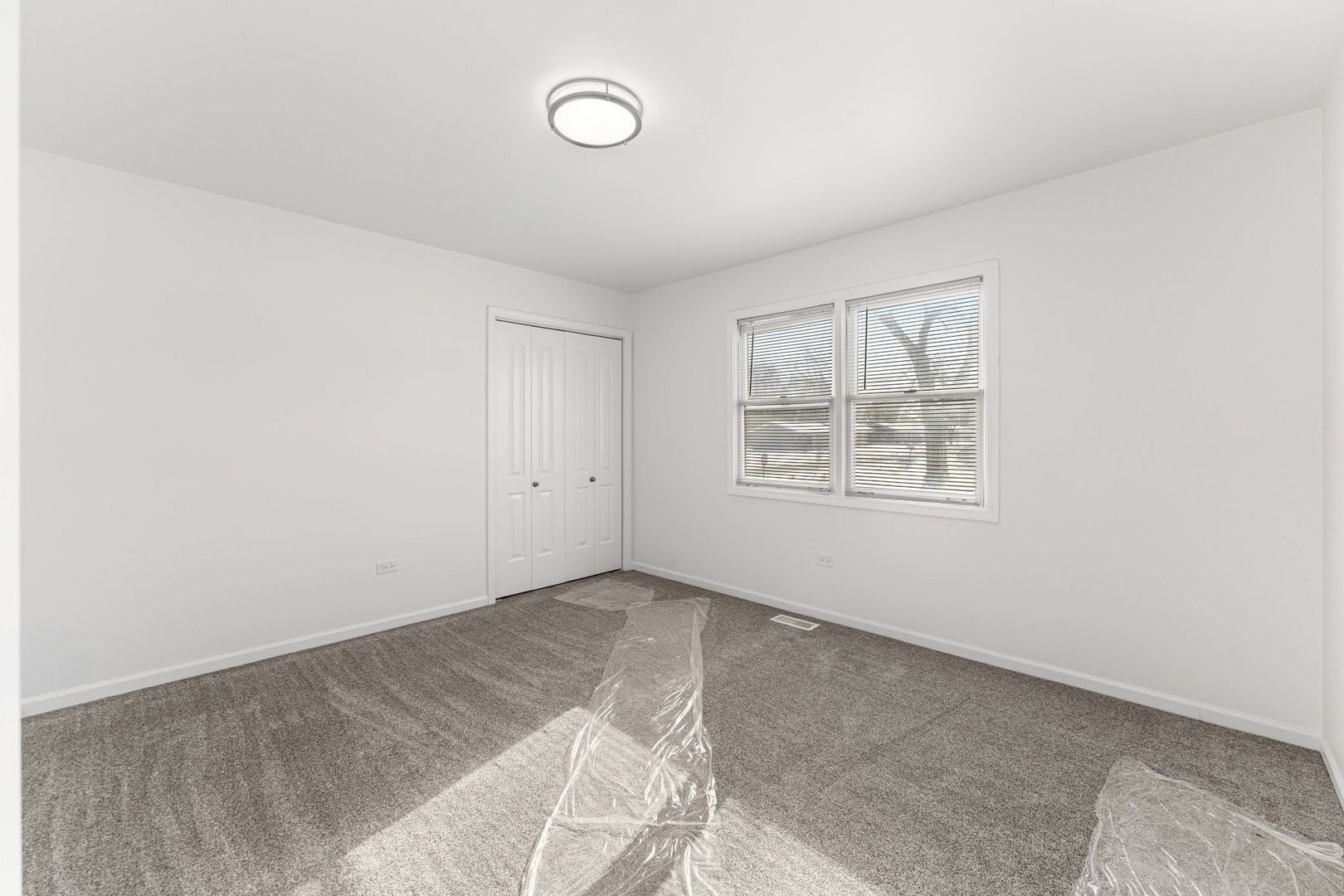 16446 Spaulding Avenue Markham, IL 60428 - Photo 12 of 27 an empty room with windows