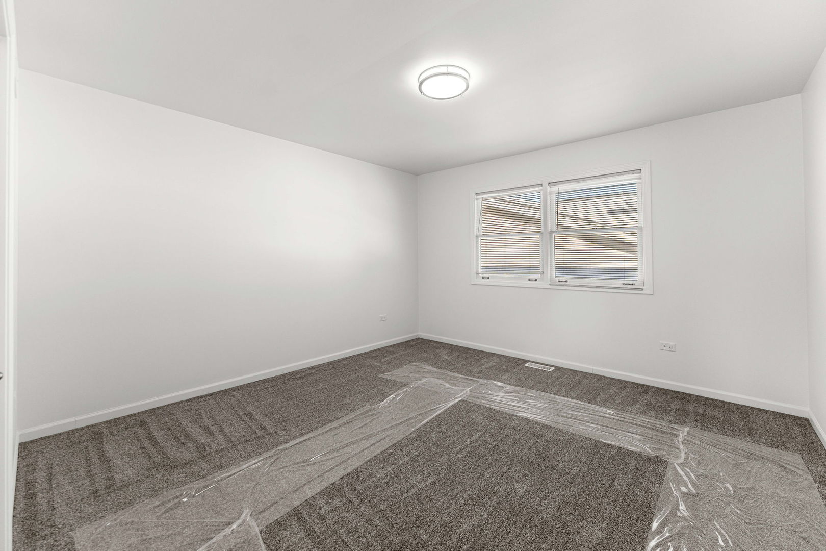 16446 Spaulding Avenue Markham, IL 60428 - Photo 13 of 27 an empty room with windows